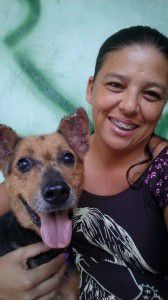 Bruce hoje sorrindo no colo da tia Célia