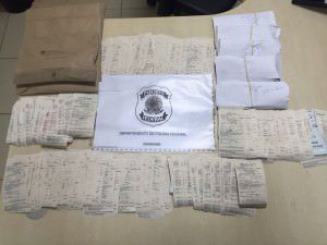 A PF recolheu documentos que comprovam o uso de "laranjas" no esquema. Foto: Divulgação