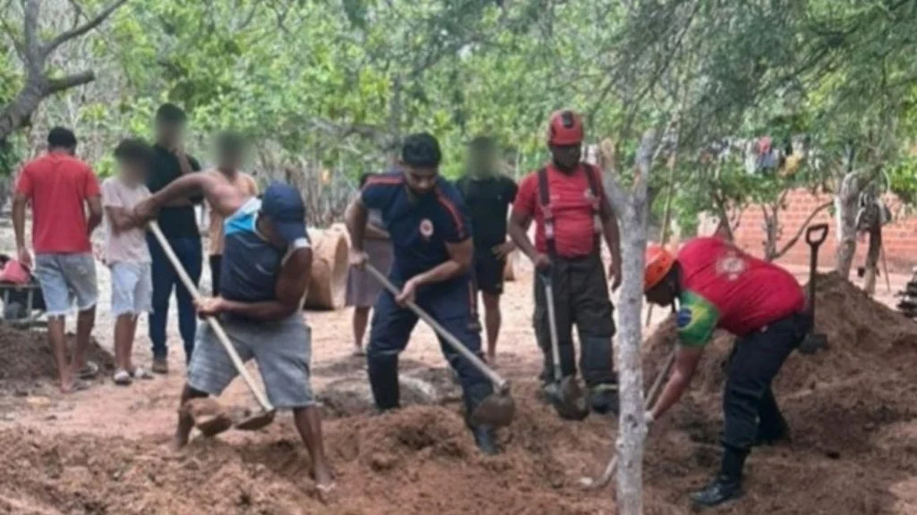 Foto ilustrativa de equipe de resgate escavando o solo com pás, sem relação direta com o caso