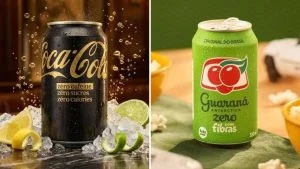 Latas da Coca-Cola sem cafeína, preta e dourada, e do Guaraná Antarctica Zero com Fibras, verde, lado a lado