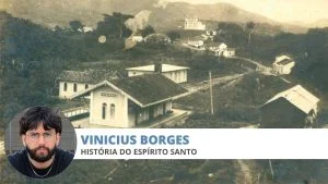 Estação ferroviária de Vianna em foto antiga, registro da história do território de Viana, com igreja ao fundo nas montanhas