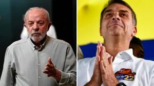 Montagem com Lula, de camisa cinza, e Flávio Bolsonaro, de mãos unidas e camisa do PL 22; votação na Serra